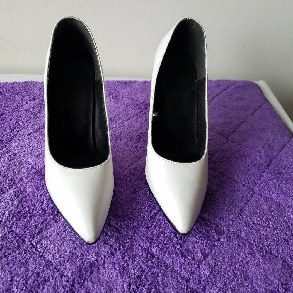 White leather pumps.